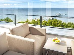 Villa Philine - Penthouse 28 mit Panoramablick, Pool, SPA & Kamin in Sellin